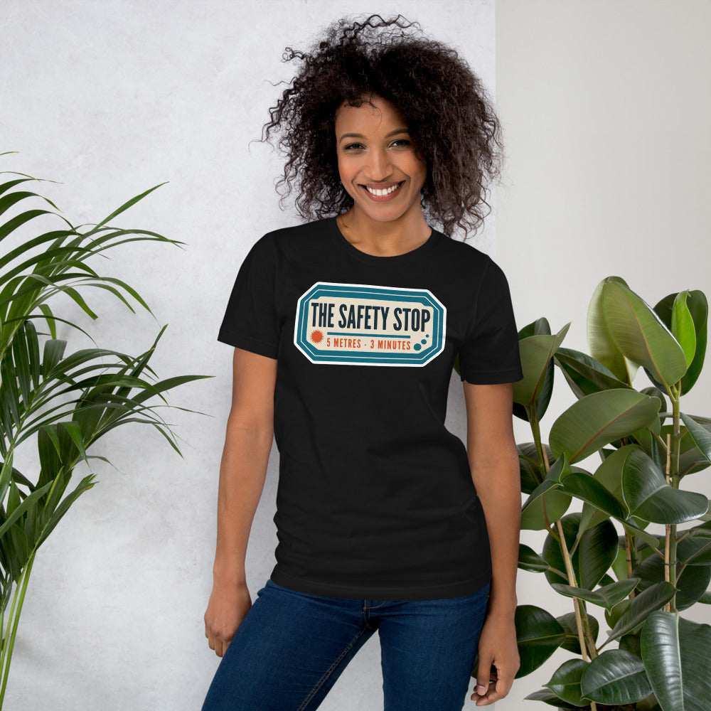 The Safety Stop vintage scuba diving travel decal t-shirt — Vintage Black, on model