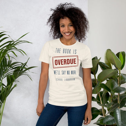 The Book Is Overdue funny school librarian t-shirt — Vintage White, on model