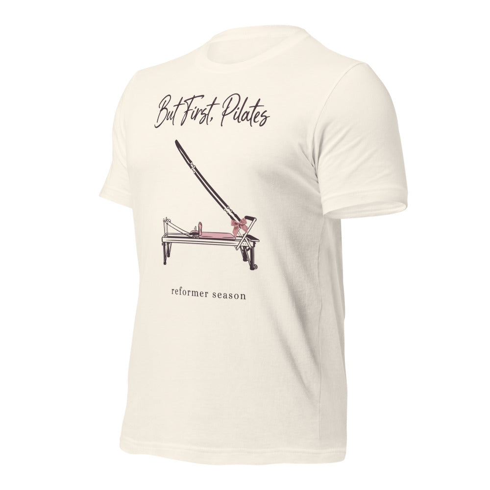But First Pilates reformer line-art tee — Vintage White, front-right