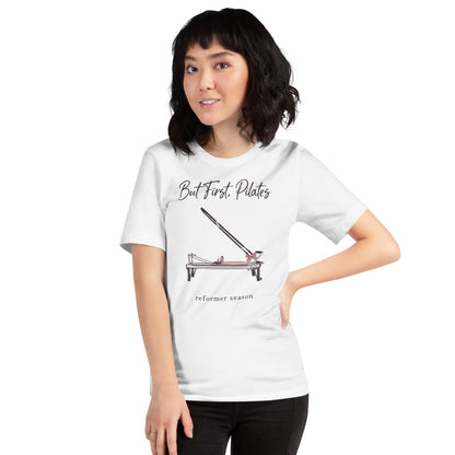 But First Pilates reformer line-art tee — White, on model