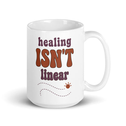 Healing Isn't Linear soft retro mental health mug — 15 oz, handle on the right