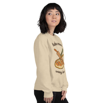 Model wearing Bake More Worry Less retro kitchen sourdough crewneck sweatshirt — Sand
