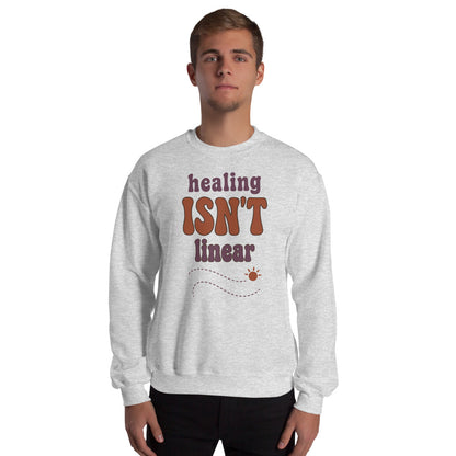 Healing Isn't Linear soft retro mental health crewneck sweatshirt — Ash, worn by model