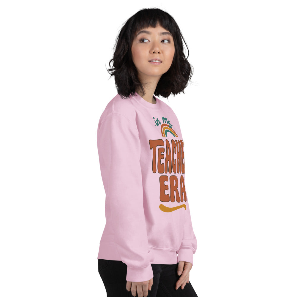 In My Teacher Era retro groovy teacher crewneck sweatshirt — Light Pink, on model