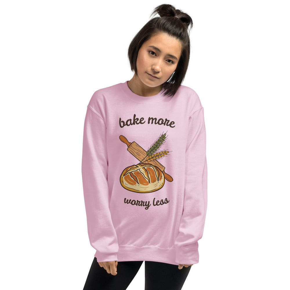 Model wearing Bake More Worry Less retro kitchen sourdough crewneck sweatshirt — Light Pink