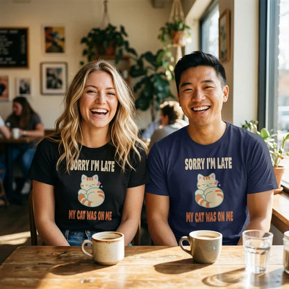 Sorry I'm Late My Cat Was On Me funny cat mom t-shirt — lifestyle, two friends at a coffee shop in Vintage Black and Navy